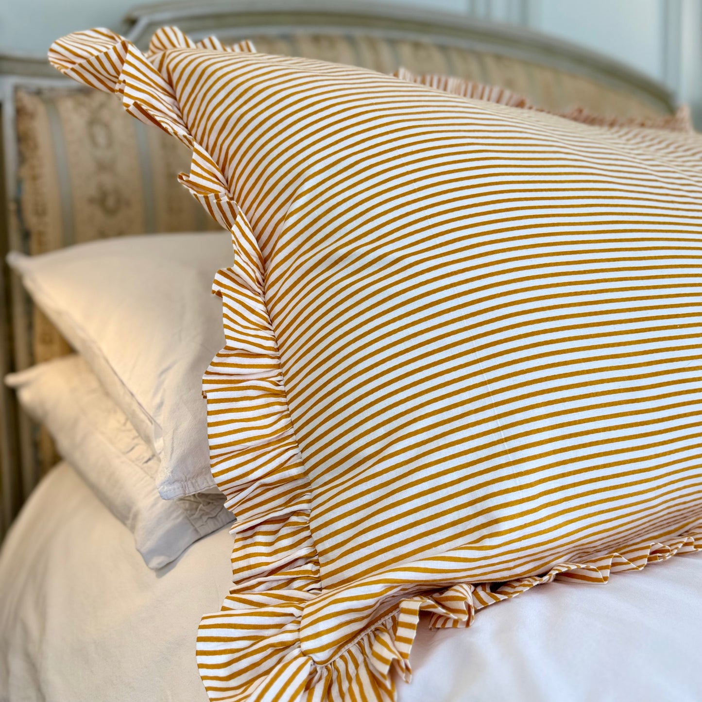 Mustard striped cotton cushion with frill