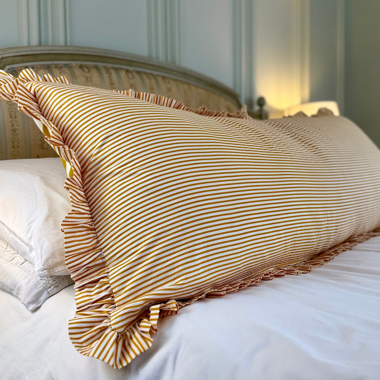 Mustard striped cotton cushion with frill