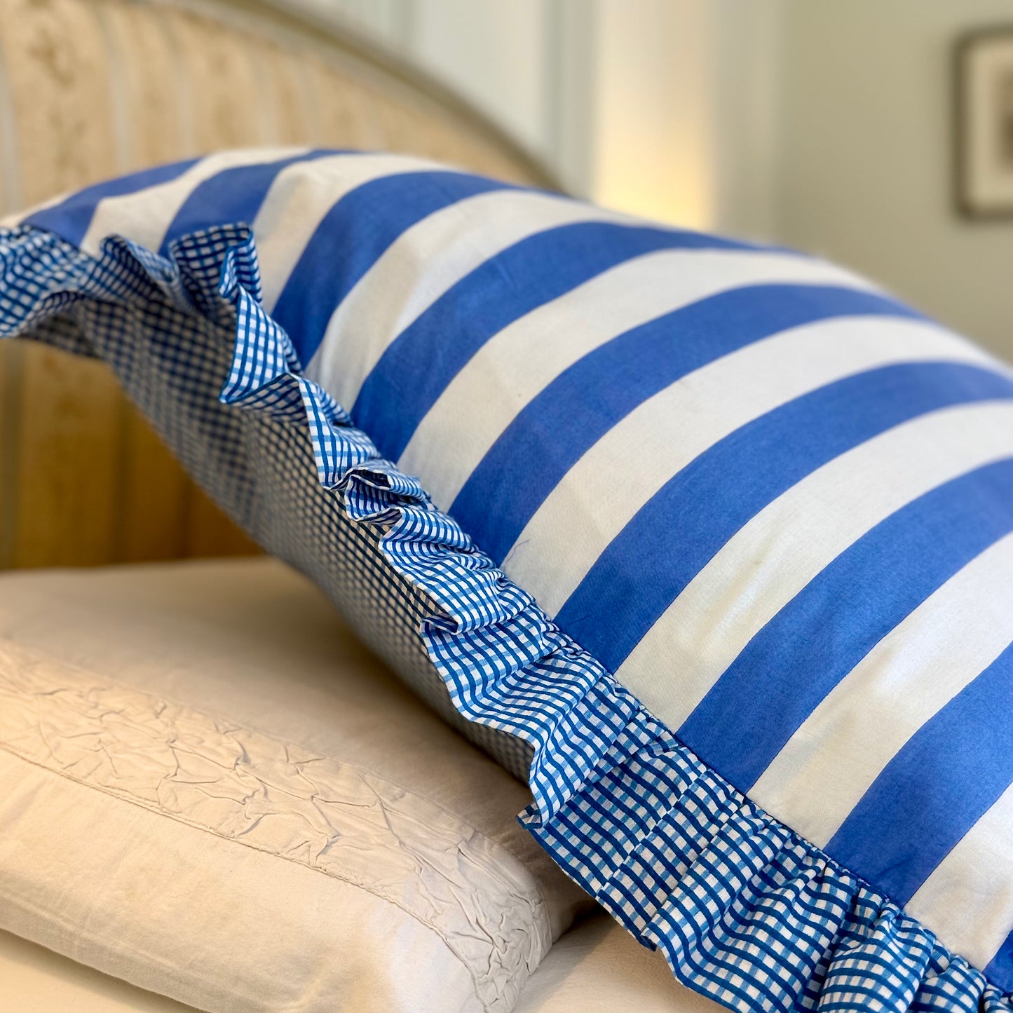 Blue striped cotton cushion with frill
