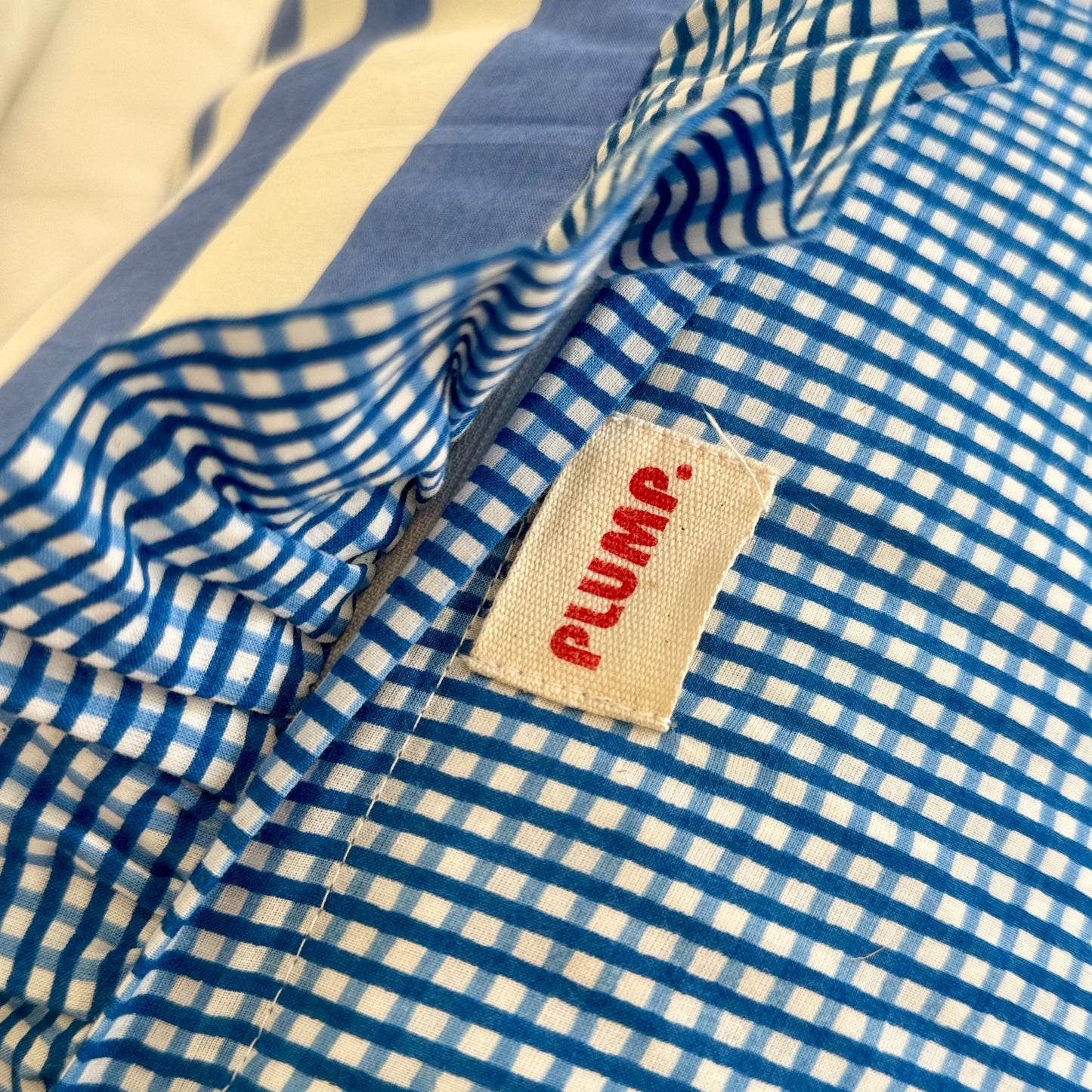 Blue striped cotton cushion with frill