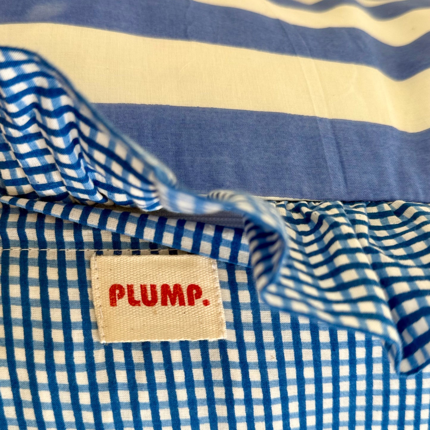 Blue striped cotton cushion with frill