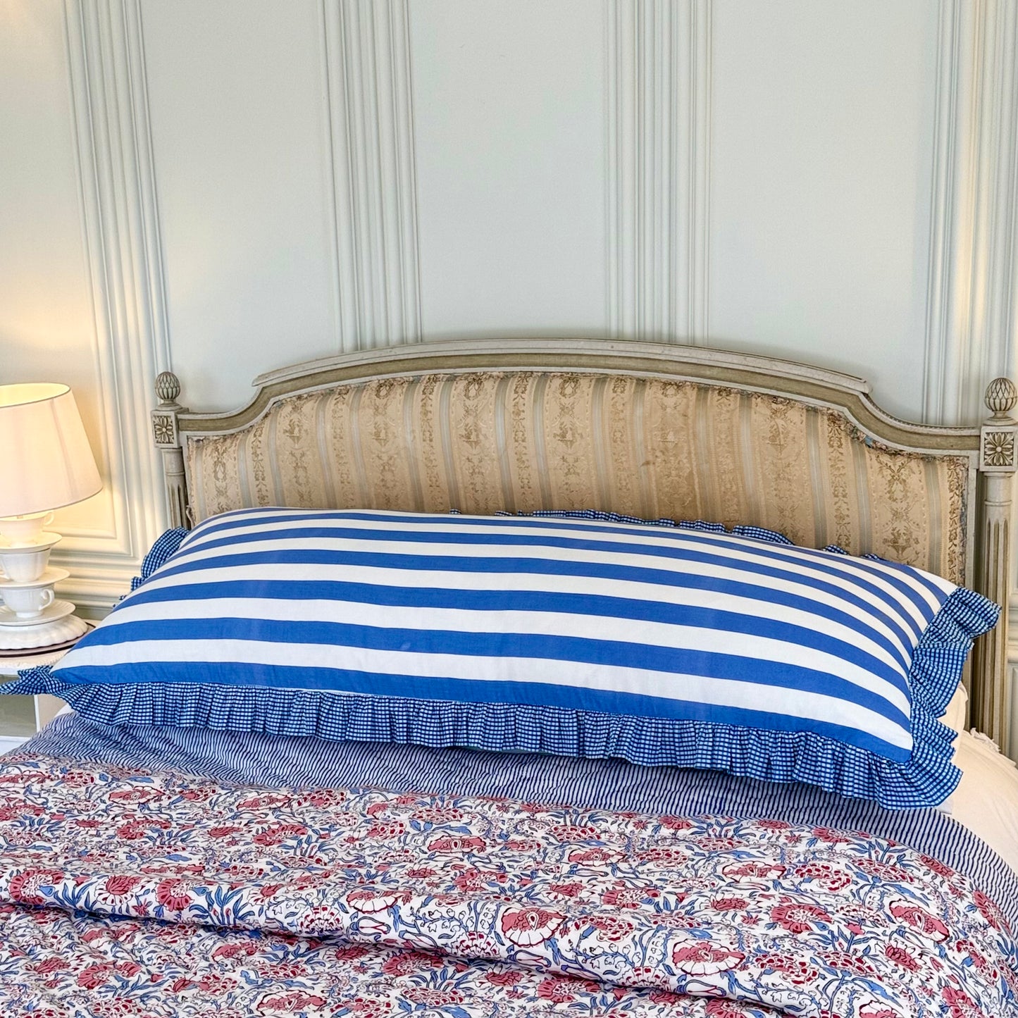 Blue striped cotton cushion with frill