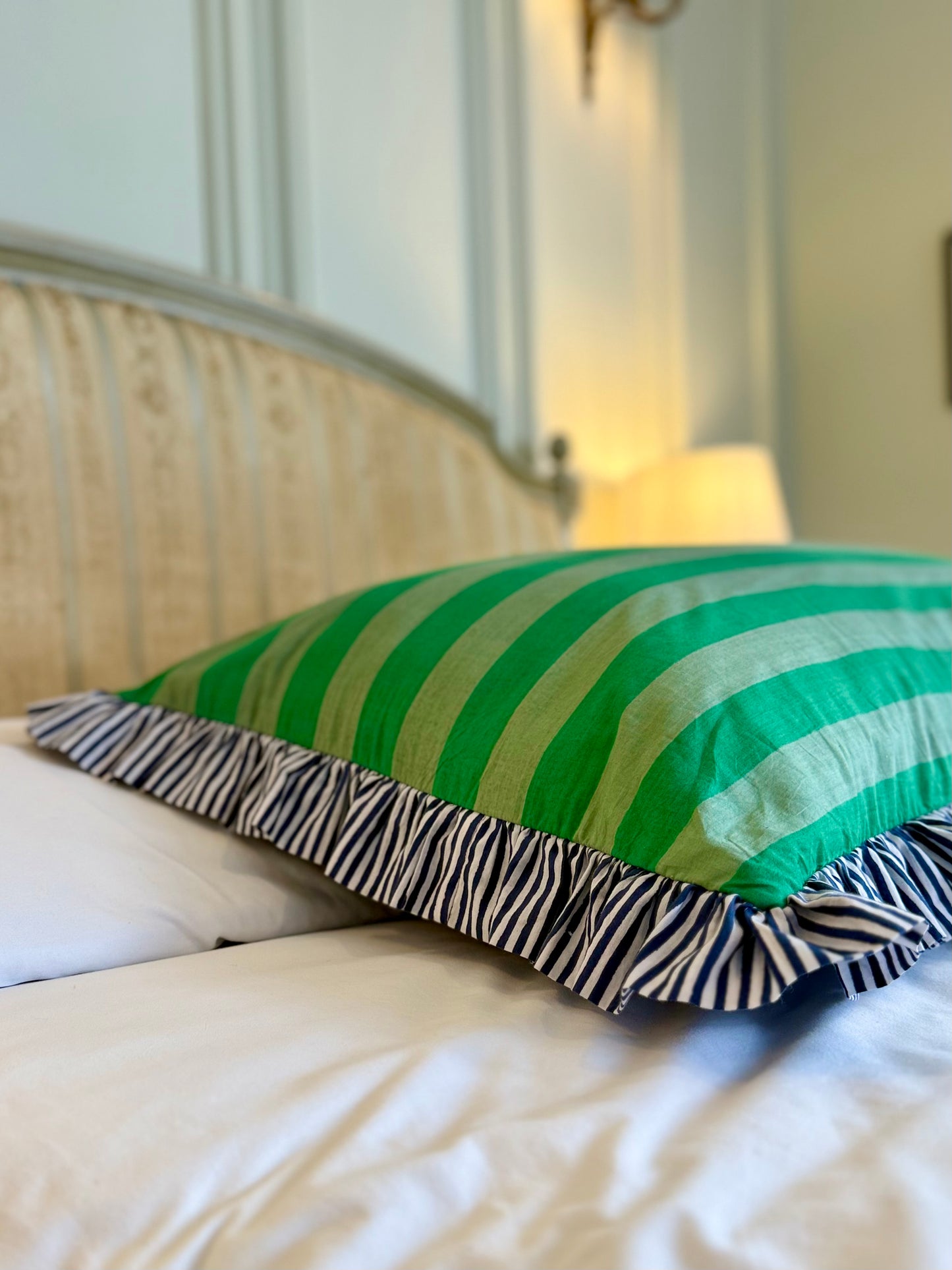 Green striped cotton cushion with frill