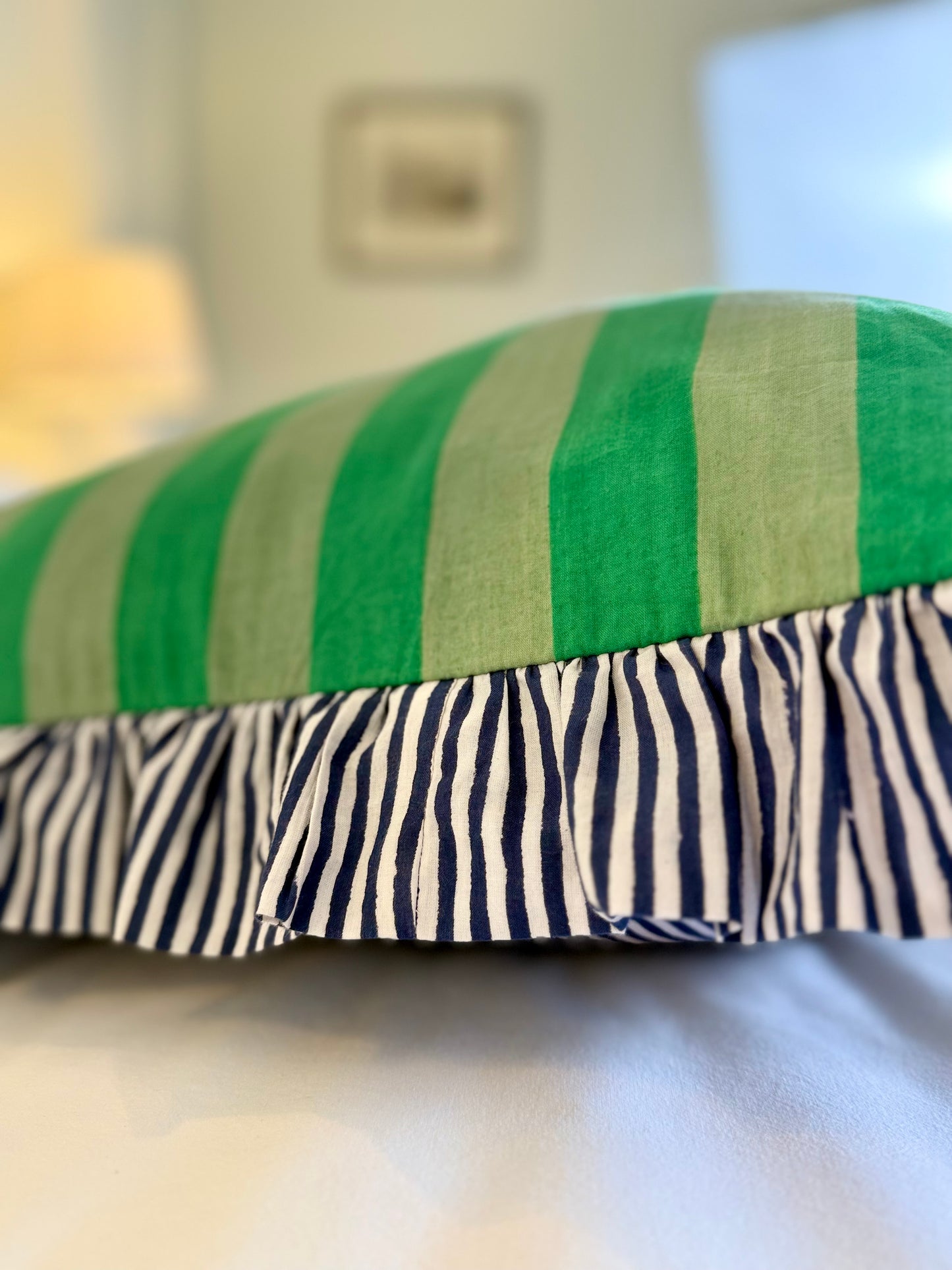 Green striped cotton cushion with frill