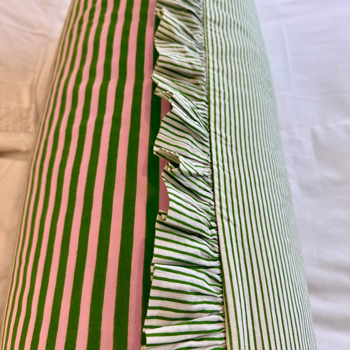 Pink and green striped cotton cushion with frill