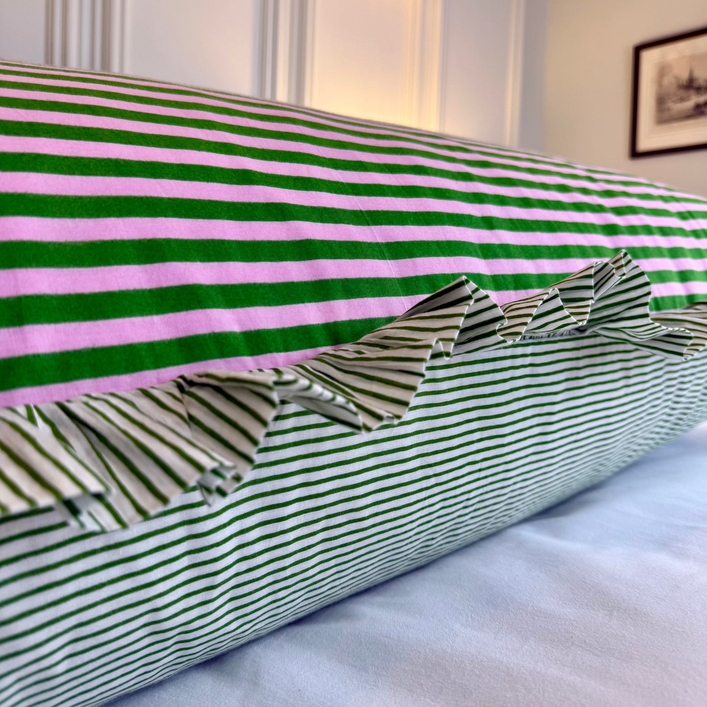 Pink and green striped cotton cushion with frill