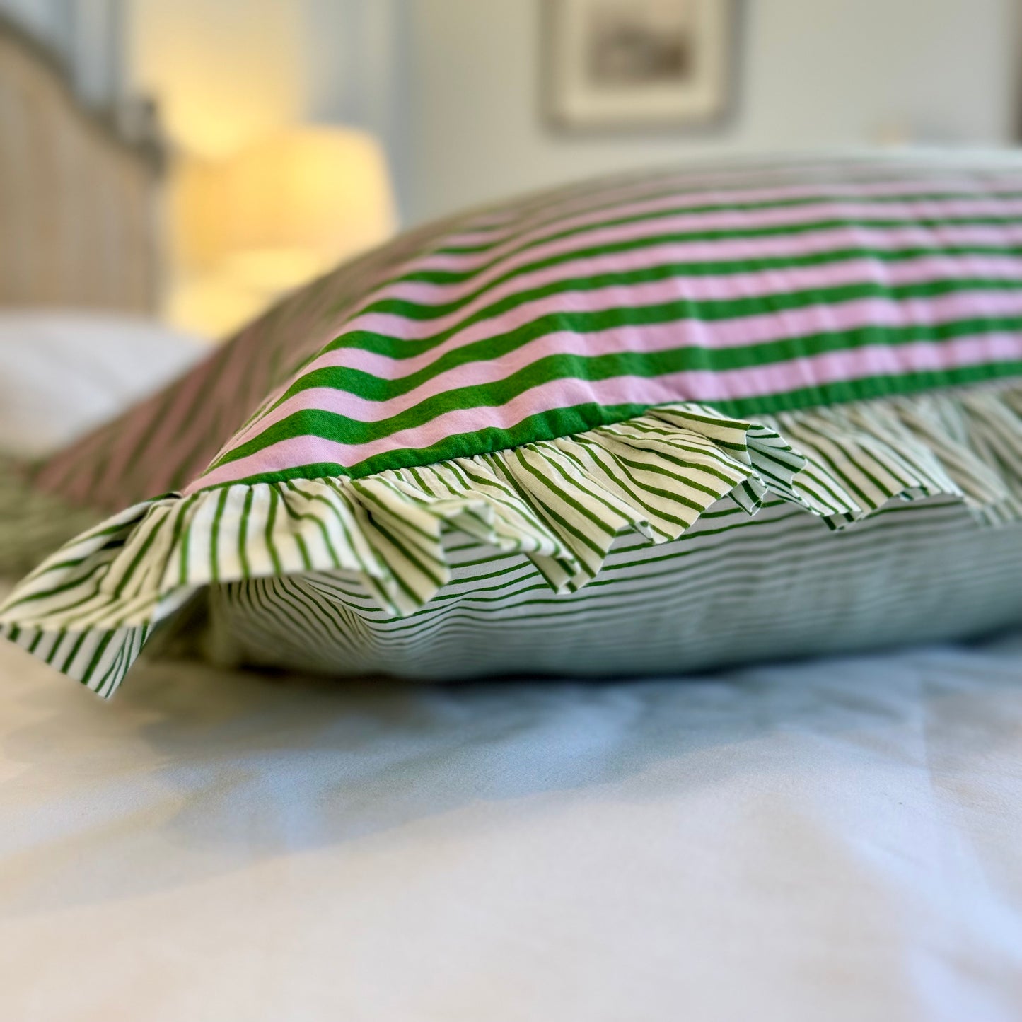 Pink and green striped cotton cushion with frill