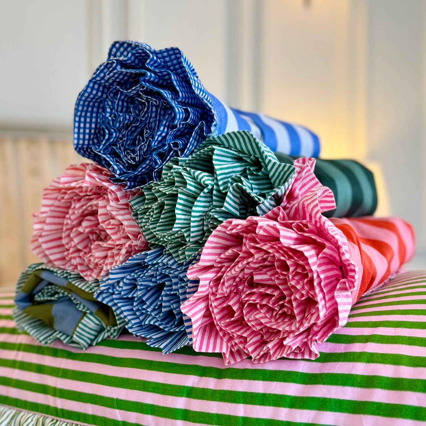 Pink and green striped cotton cushion with frill